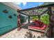 Outdoor patio features a cabana with bench seating at 301 Cevera Dr, Dunedin, FL 34698