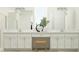 Bright bathroom featuring double sinks, sleek fixtures, and ample counter space at 31616 Cardinal Yard Dr, San Antonio, FL 33576