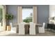 Inviting dining room with minimalist style, a rustic table, and modern chairs at 31616 Cardinal Yard Dr, San Antonio, FL 33576
