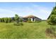 Well-maintained backyard with lush landscaping at 3312 Francoa Dr, Odessa, FL 33556