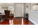 Inviting foyer featuring beautiful hardwood floors, natural light, and elegant decor at 3312 Francoa Dr, Odessa, FL 33556