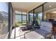 Relaxing screened lanai featuring comfortable lounge furniture at 3312 Francoa Dr, Odessa, FL 33556