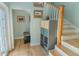 Inviting entryway with hardwood floors, a staircase, and neutral decor at 3516 W Santiago St, Tampa, FL 33629