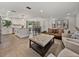 Spacious open-concept with a modern kitchen, dining area, and comfortable living space, perfect for entertaining at 37153 Mcminn Ave, Dade City, FL 33525