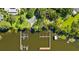 Lakeside community view from above showing docks and boat slips at 3772 Woodridge Pl, Palm Harbor, FL 34684