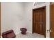 Bathroom with a red toilet and bidet near the paneled door at 3772 Woodridge Pl, Palm Harbor, FL 34684