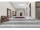 Elegant bathroom features a red tub, marble steps, and ornate mirrors at 3772 Woodridge Pl, Palm Harbor, FL 34684