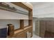 Large storage area with shelves and cabinets for organization at 3772 Woodridge Pl, Palm Harbor, FL 34684