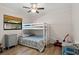 bedroom featuring a bunk bed, neutral walls, a ceiling fan, and wood-look floors at 39 Bishop Creek Dr, Safety Harbor, FL 34695