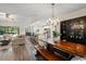 Open-concept dining area and living room flow to the kitchen, creating an inviting and connected space at 39 Bishop Creek Dr, Safety Harbor, FL 34695