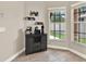 Cozy breakfast nook with a wine rack and views of the fenced backyard at 406 Laguna Mill Dr, Ruskin, FL 33570