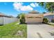 Charming single-Gathering home with a two-car garage, well-manicured lawn, and inviting curb appeal at 406 Laguna Mill Dr, Ruskin, FL 33570