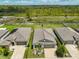Charming one-story home with a well-manicured lawn, landscaping and a two car garage at 4485 Eternal Prince Dr, Sun City Center, FL 33573