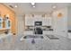 Bright kitchen featuring granite countertops, stainless steel sink, and modern appliances at 4485 Eternal Prince Dr, Sun City Center, FL 33573