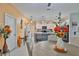 Beautiful modern kitchen with white cabinetry, stainless steel appliances, and an island with bar seating at 4485 Eternal Prince Dr, Sun City Center, FL 33573