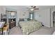 Serene primary bedroom with neutral paint, a window with natural light, and a ceiling fan at 4485 Eternal Prince Dr, Sun City Center, FL 33573
