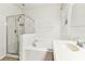Bright bathroom featuring a tub and shower combination at 518 Winthrop Dr, Spring Hill, FL 34609
