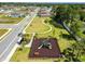Aerial view of a playground and green space within a residential community at 518 Winthrop Dr, Spring Hill, FL 34609