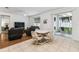 Open floor plan with living and dining spaces, leading to an outdoor patio at 518 Winthrop Dr, Spring Hill, FL 34609