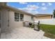 Outdoor patio area with grill, ideal for backyard barbecues and entertaining at 518 Winthrop Dr, Spring Hill, FL 34609