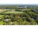 Aerial view of property with surrounding green space in Lutz, Florida at 523 2Nd Sw Ave, Lutz, FL 33548