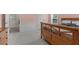 Comfortable bedroom featuring carpeted floors, light pink walls, and natural light at 523 2Nd Sw Ave, Lutz, FL 33548