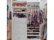 Organized walk-in closet with shelves, drawers, and hanging rods provides plenty of storage at 523 2Nd Sw Ave, Lutz, FL 33548