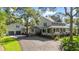 Stately two-story home with a welcoming front porch and well-manicured landscaping at 523 2Nd Sw Ave, Lutz, FL 33548