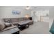 Upstairs living room has comfortable seating and a view of the outdoors at 523 2Nd Sw Ave, Lutz, FL 33548