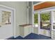 Inviting mud room with a convenient sink, storage cabinets, and access to the outdoors at 523 2Nd Sw Ave, Lutz, FL 33548