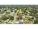 Aerial view showcases neighborhood streets lined with beautiful mature trees at 5514 7Th N Ave, St Petersburg, FL 33710