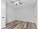 This is a bedroom featuring wood laminate floors, and ceiling fan at 5514 7Th N Ave, St Petersburg, FL 33710