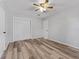 Spacious bedroom with new flooring, large closet, and white walls at 5514 7Th N Ave, St Petersburg, FL 33710