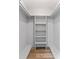 This is a walk in closet featuring built in shelving at 5514 7Th N Ave, St Petersburg, FL 33710