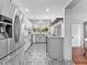 Updated kitchen featuring modern appliances, stylish backsplash, and bright countertops at 5514 7Th N Ave, St Petersburg, FL 33710