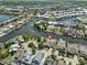 Stunning aerial perspective of a waterfront community with lush landscaping and serene canals at 5710 Tortoise Pl, Apollo Beach, FL 33572