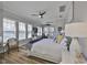 This sun-filled bedroom offers lots of natural light and ample space for relaxation and fitness at 5710 Tortoise Pl, Apollo Beach, FL 33572