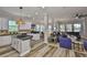 Bright, open-concept layout connecting the kitchen, dining, and living areas for seamless living at 5710 Tortoise Pl, Apollo Beach, FL 33572