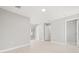 Spacious bedroom with neutral paint, white trim, and ample closet space at 6012 Flora Ter, Apollo Beach, FL 33572