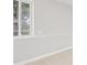 Bright bedroom with large window and neutral color scheme at 6012 Flora Ter, Apollo Beach, FL 33572