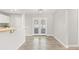 Open dining area with French doors leading to outdoor space and backyard at 6012 Flora Ter, Apollo Beach, FL 33572