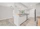 Modern kitchen features stainless appliances, wood countertops, and stylish mosaic backsplash at 6012 Flora Ter, Apollo Beach, FL 33572