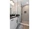 Bathroom features glass shower with a niche, and a modern sink and vanity at 604 Kinnear Dr, Brooksville, FL 34601