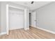 Bedroom with closet and hardwood floors at 604 Kinnear Dr, Brooksville, FL 34601