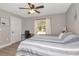 Bedroom offers closet, desk area, and hardwood floors at 604 Kinnear Dr, Brooksville, FL 34601