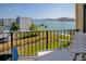 Enjoy the views from this condo's balcony, overlooking lush landscaping and the tranquil bay waters at 650 Island Way # 606, Clearwater Beach, FL 33767