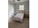 Bedroom with closet and nice bedside table lamp at 7651 46Th N Way, Pinellas Park, FL 33781