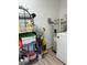 Utility room with shelving, water heater and possibly a washer/dryer unit at 7651 46Th N Way, Pinellas Park, FL 33781