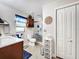 Bathroom featuring a glass shower, white toilet, and wooden cabinets at 8110 Damara Dr, New Port Richey, FL 34653