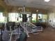 Bright community gym featuring modern exercise equipment and a window view at 9100 Dr Martin Luther King Jr N St # 303, St Petersburg, FL 33702